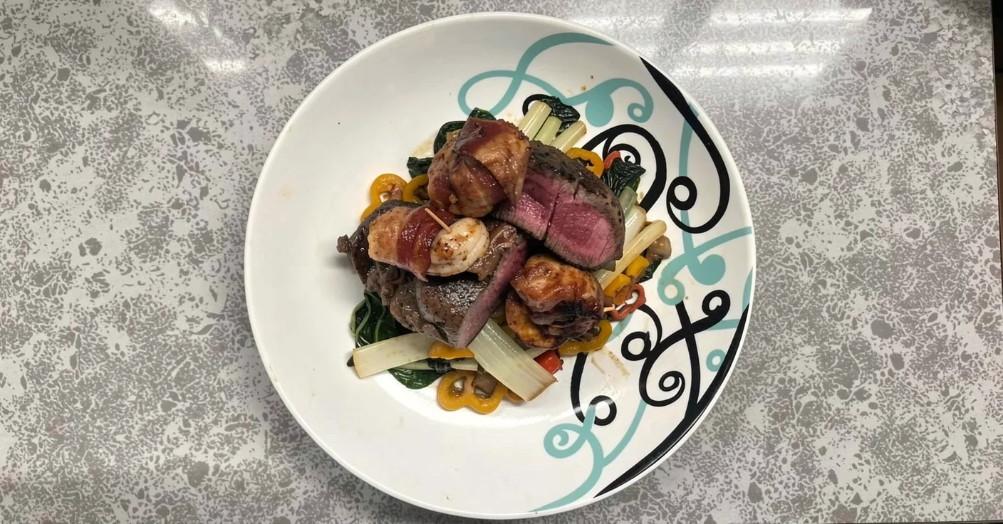 Filet Mignon W Bacon Wrapped Shrimp Over Spiced Bok Choy